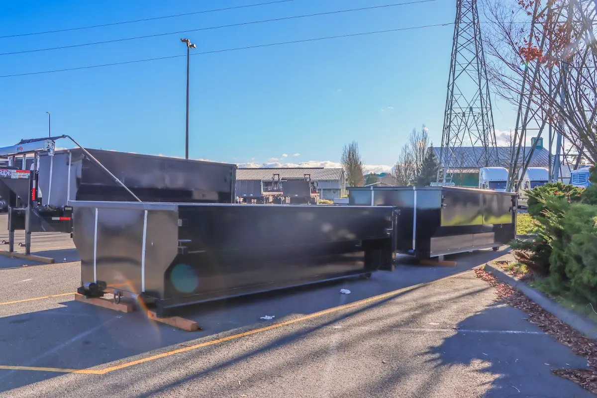 Roll-off dumpster ready for waste disposal at job site for Concrete Dumpster Rental in East Haven